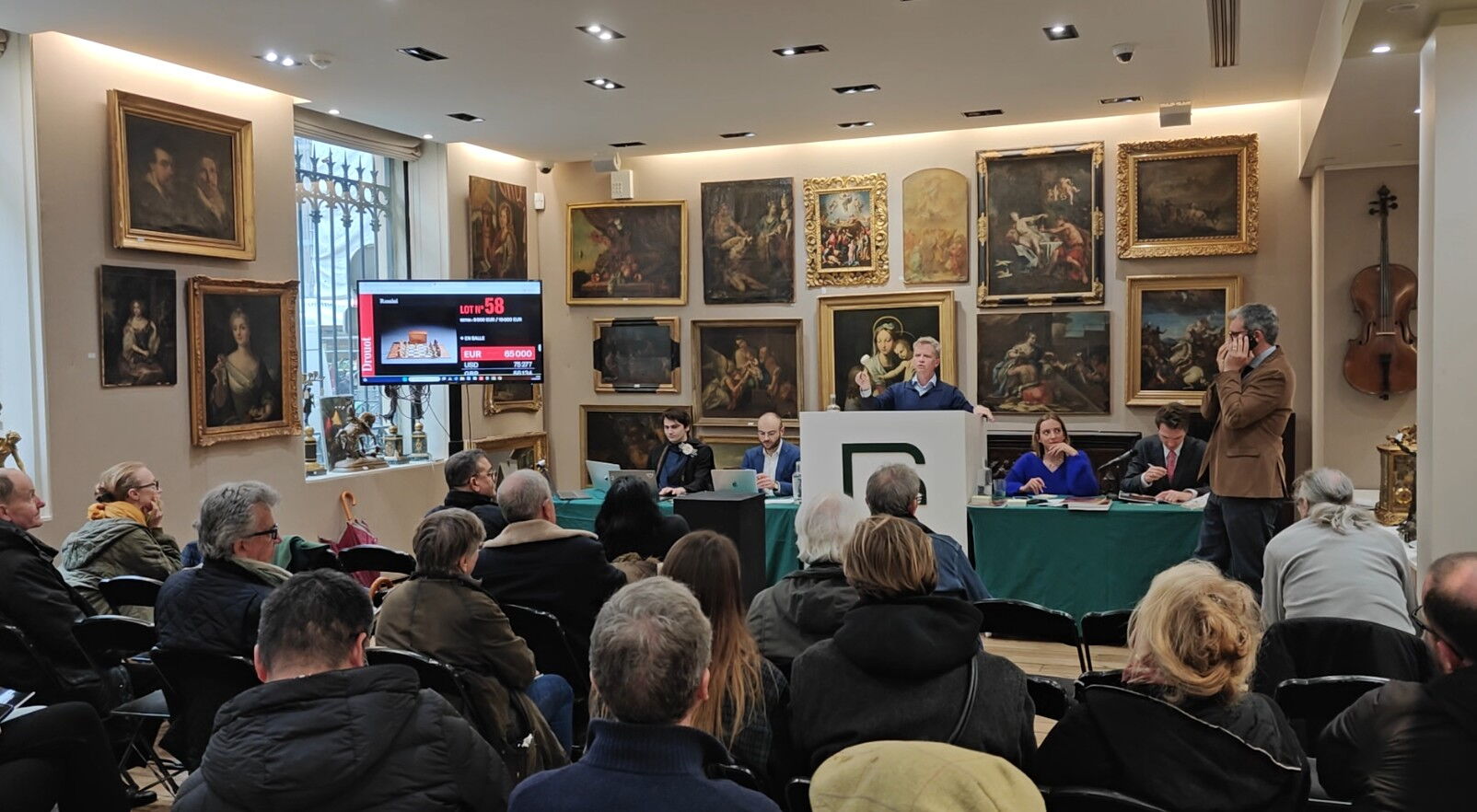 Just before the auctioneer’s final hammer blow