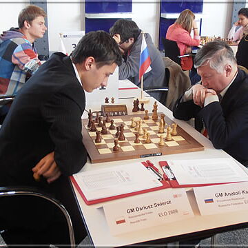 Anatoli Karpov vs Dariusz Swiercz (Poland) with an inimitable endgame (1-0).