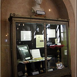 Different glass cabinets and display cases house intriguing chess memorabilia