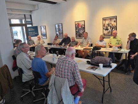 A spellbound audience listens to a contribution to the discussion.