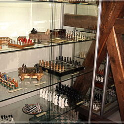 Glass cabinets with beautiful chess sets