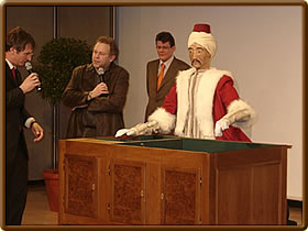 Norbert Ryska interviewing Bernhard Fromme, Dr. Stefan Stein in the background.